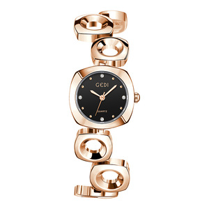 Montre pour femme de grande valeur, élégante, bracelet irrégulier, alliage artistique, montre à quartz - Product Image 1