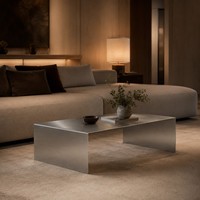 Table basse moderne en acier inoxydable en forme de U avec design décoratif, finition métal brossé, fabriquée à la main pour salon, mobilier d'hôtel