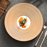Assiette peu profonde en porcelaine à motif uni peinte à la main, style luxe léger haut de gamme, or rose, pour cuisine occidentale