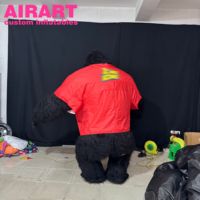 Costume gonflable de gorille en peluche portant un gilet rouge Costume gonflable de gorille noir Costume gonflable de gorille en peluche Costume gonflables
