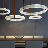 Lustre en albâtre en bronze de luxe, suspension cylindrique en marbre, design unique pour la décoration intérieure