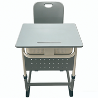 Ensemble Chaise et Bureau Scolaire en Métal à Hauteur Fixe avec Panneau Perforé, Table d'Étude Grise Durable avec Boîte à Livres, Mobilier Étudiant Moderne