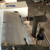 Machine de découpe semi-automatique pour tubes en papier, avec couteaux rotatifs pour le refendage de cartons et de noyaux en carton