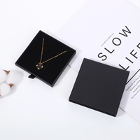 Boîte à bijoux de luxe personnalisée en carton noir écologique et biodégradable avec gaufrage et lamination mate, tiroir coulissant intégré