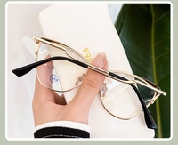 Venta al por mayor ojo de gato marcos de Gafas de metal óptico anti luz azul marcos de gafas de ordenador