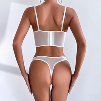 Ensemble de lingerie 2 pièces transparent de luxe en dentelle brodée pour femme, avec string et body sexy, vente en gros