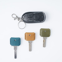 Prix de gros Porte-clés en cuir Porte-clés en cuir de luxe Porte-clés en cuir véritable imperméable pour maison