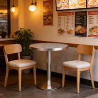 Mobilier de restaurant pour l'hôtellerie : Banquette contemporaine en tissu, chaise rembourrée avec base métallique, table carrée en marbre