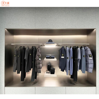 Nouvelle boutique Vitrine de vêtements Design personnalisé Table vitrine en acier inoxydable pour magasin de vêtements