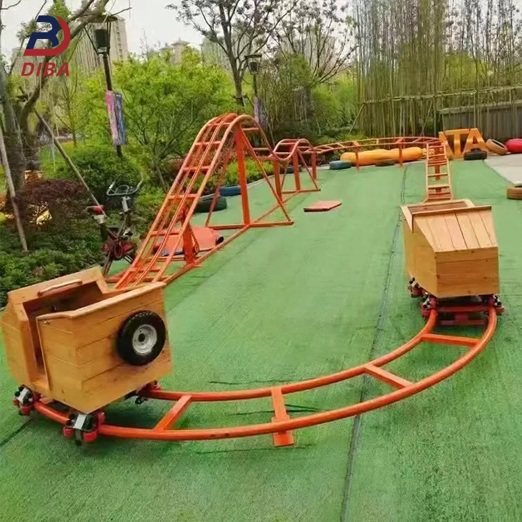 子供のためのホット販売ミニ裏庭スピニングローラーコースター人間のペダル動力ローラーコースター遊園地の乗り物