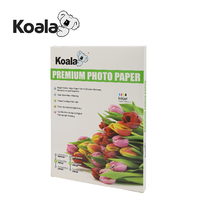 Usine OEM en Chine A4 * 20 feuilles de papier autocollant de glissière d'eau de lumière laser pour le transfert de surface dure de bureau