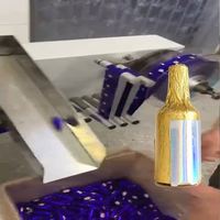 Machine d'emballage en aluminium pour confiseries en forme de bouteille imitation, entièrement automatique, à fonctionnement rapide et sur mesure