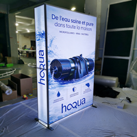 Stand d'exposition pop-up avec éclairage LED rétroéclairé, cadre en aluminium et toile tendue pour salon professionnel