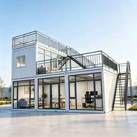 Cabane Apple en acier blanc surélevée à deux niveaux avec bar et terrasse en bois pour salon extérieur