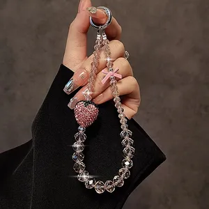 Chaîne de téléphone de luxe rose scintillante avec pendentif nœud fraise en cristal pour <span class=keywords><strong>iPhone</strong></span>, sangle de <span class=keywords><strong>bijoux</strong></span>, cadeau pour fille, décoration suspendue, cordon porte-clés - Product Image 5