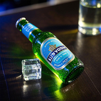 Meilleures ventes de bouteilles de bière en verre vides en gros avec bouchon Crown Qualité supérieure pour bars et restaurants