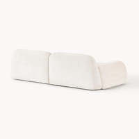 Canapé modulaire 3 places en tissu rembourré, style moderne et minimaliste, avec rembourrage en mousse, idéal pour appartement ou villa, décoration intérieure.
