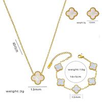 Parure de bijoux trèfle porte-bonheur en acier inoxydable plaqué or léger pour femme : collier, bracelet, bague et boucles d'oreilles pour soirée