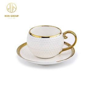 Juego de Tazas de Té de Porcelana Creativas de Forma Redonda en Color Blanco <span class=keywords><strong>y</strong></span> Dorado para Restaurante de Lujo, <span class=keywords><strong>Plato</strong></span> de Cerámica, <span class=keywords><strong>Taza</strong></span> de <span class=keywords><strong>Café</strong></span> <span class=keywords><strong>y</strong></span> Platillo de Cerámica - Product Image 2