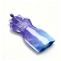 Op maat bedrukte speciale vorm plastic aluminiumfolie staande zak met uitgiettuit voor vloeibare vruchtensap, met kleurrijke dop