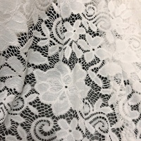 Tissu de dentelle florale extensible en nylon français classique pour vêtements LT21513