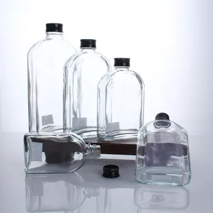 Venta caliente de todos los tamaños Mini botellas de vino de jugo de vidrio plano para bebidas