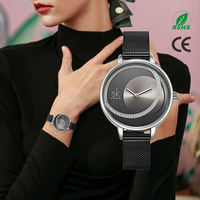 Montre créative pour femme avec bracelet en maille, cadran unique à motif lunaire et strass étincelants, élégante montre-bracelet à quartz