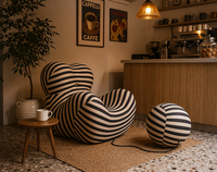 Pouf gonflable en PVC noir rayé, style vintage, portable, rond, sculptural, design affirmé, relaxant, imperméable, compressé, pour salon