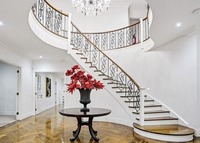 Escalier courbé orné pour les halls d'hôtels de luxe et les entrées de bâtiments commerciaux haut de gamme