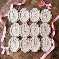 Panneaux de développement mensuel en bois pour bébé (1 à 12 mois) avec nœud ovale en dentelle, accessoires de photographie pour nouveau-né, cadeau de baby shower et décoration de chambre d'enfant