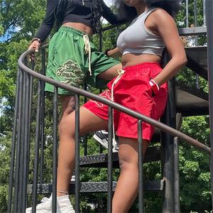 Short personnalisé pour femmes Short de gym pour femmes en nylon 100% Short coupe-vent brodé en chenille - Product Image 5