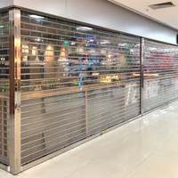 Porte à enroulement motorisée automatique en PC transparent pour entrée de bâtiment