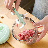 Draagbare handmatige mini-voedselprocessor, handmatige trekkoord-knipper voor knoflook, ui, fruit en groenten.