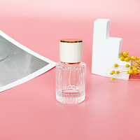 Nuevo Estilo Botella de Perfume de Vidrio de Lujo de 30ml con Forma de Cilindro y Frasco de Vidrio Transparente con Atomizador de 50ml