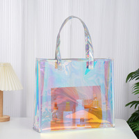 En gros personnalisé coloré laser holographique mode clair transparent imperméable PVC fourre-tout cadeau femmes sac à provisions poignées