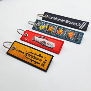 Tissu personnalisé brodé tissu de mode avant étiquette de vol personnalisé avion Logo Keytag tissu personnalisé tissé porte-clés anneau - Product Image 1