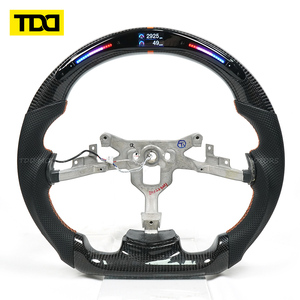 Volante Deportivo de Cuero y Fibra de Carbono con LED, Compatible con Chevrolet Corvette C6, con Marca Central Naranja y Costuras Personalizadas - Product Image 1