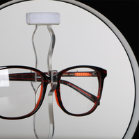 Vente en gros de présentoir créatif pour lunettes à lévitation magnétique, éclairage LED, présentoir rotatif pour lunettes de soleil