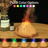 Diffuseur d'huiles essentielles et humidificateur de style moderne pour la maison, avec lumière d'ambiance sept couleurs et flamme simulée, télécommande incluse