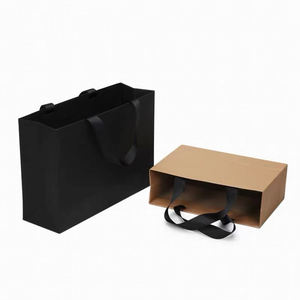 Bolsa de papel Logotipo impreso personalizado Ropa de lujo Compras Bolsas de papel Boutique Bolsa de regalo reciclable con asas de cuerda de cinta - Product Image 4