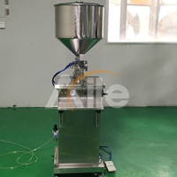 Machine de remplissage pneumatique semi-automatique Aile en acier inoxydable pour pots cosmétiques, haute précision 0,01 %, longue durée de vie - Offre Spéciale