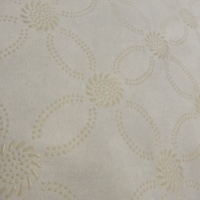 Tissu en polyester tricoté antidérapant jaune à texture florale en relief pour literie et housses de matelas