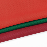 Tissu tricoté 100 % polyester uni, effet œil-de-perdrix, tissu œillet en polyester très demandé pour les vêtements de sport