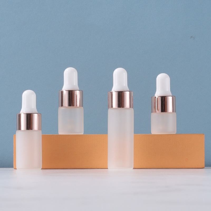 Frosted glass bottle + gold ring + white silicone tip