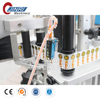 Prix usine étiqueteuse ronde en plastique verre bouteille de vin adhésif autocollant poignée étiquetage Machine d'emballage