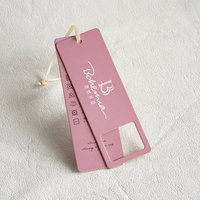 Étiquettes de vêtements en papier laminé imprimées en feuille d'argent écologiques, design personnalisé rose, couleurs personnalisées, formes personnalisables