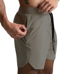 กางเกงขาสั้นออกกำลังกายผู้ชายสีพื้นผ้าตาข่ายผสมคอตตอน ระบายอากาศ แห้งเร็ว เป็นมิตรกับสิ่งแวดล้อม เหมาะสำหรับฤดูร้อน ราคาประหยัด - Product Image 2