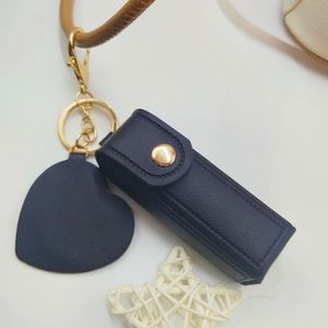 Organisateur de baume à lèvres promotionnel, étui de rangement de maquillage en cuir PU pour voyage, miroir en forme de cœur, porte-rouge à lèvres pour femmes, porte-clés, logo personnalisé - Product Image 2
