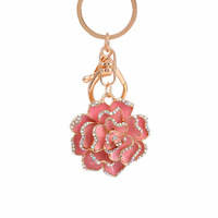 Porte-clés de voiture en alliage de zinc, style rose camélia japonaise, design moderne, avec pendentif USB, vente en gros