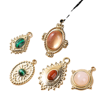 Approvisionnement direct transfrontalier de pendentifs ovales en acier titane incrustés de malachite, cristal rose rond, accessoires de bijoux DIY